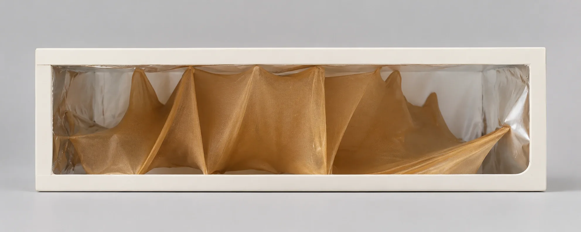 BLUR gold translucent material prototype inside a long rectangular frame