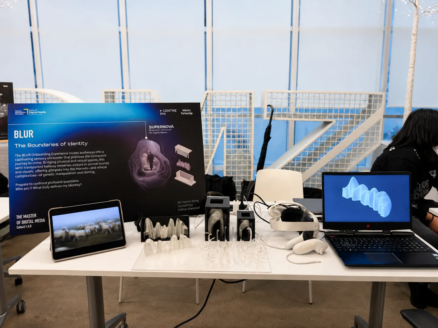 BLUR final presentation table with prototypes and VR material
